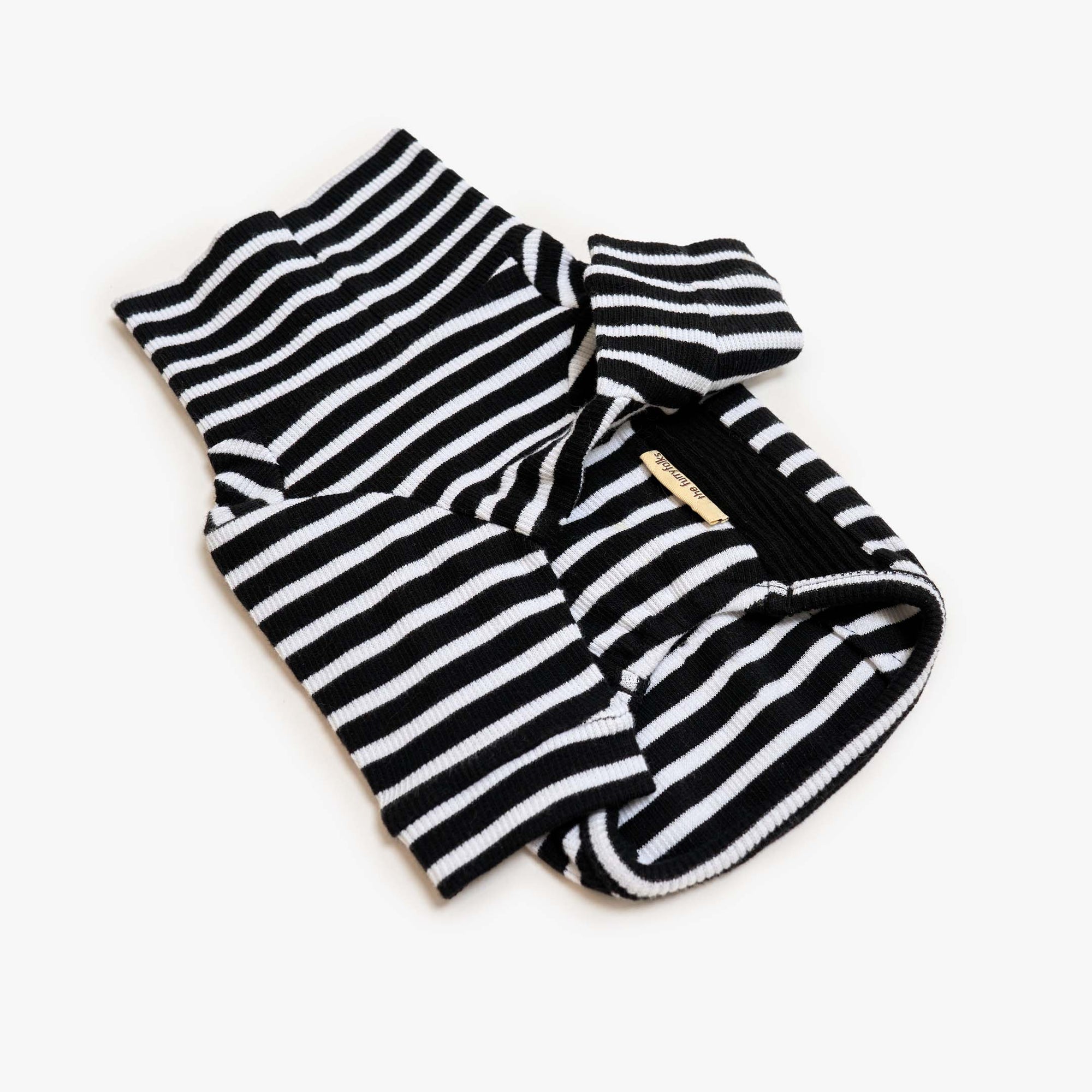 Black and white striped dog shirt with ribbed detail, ideal for stylish and comfortable pet wear.