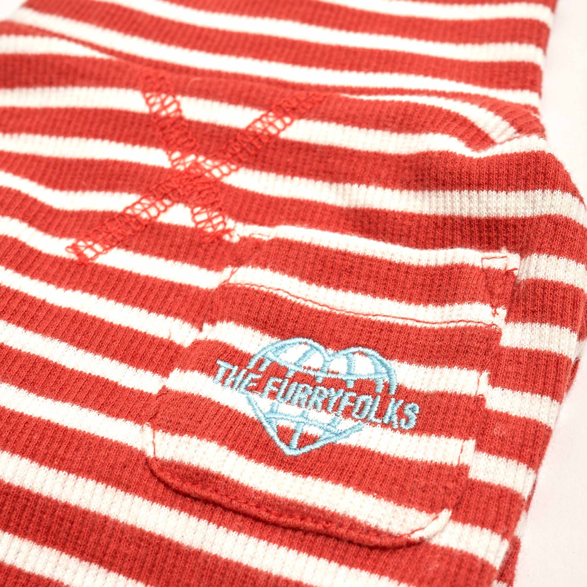 Detail of a Rust & Ivory  striped dog shirt featuring 'THE FURRYFOLKS' logo, embodying pet-friendly fashion.
