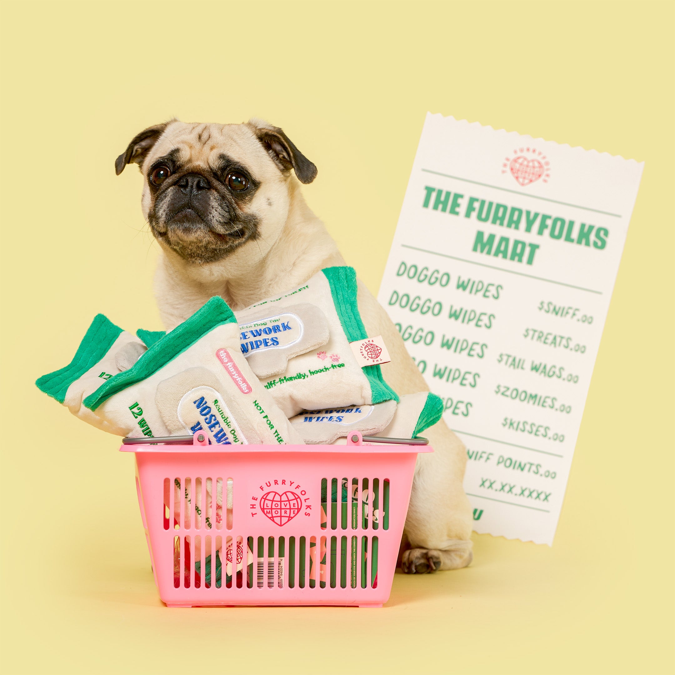 Pug with a pink basket full of dog products and a receipt on a yellow background