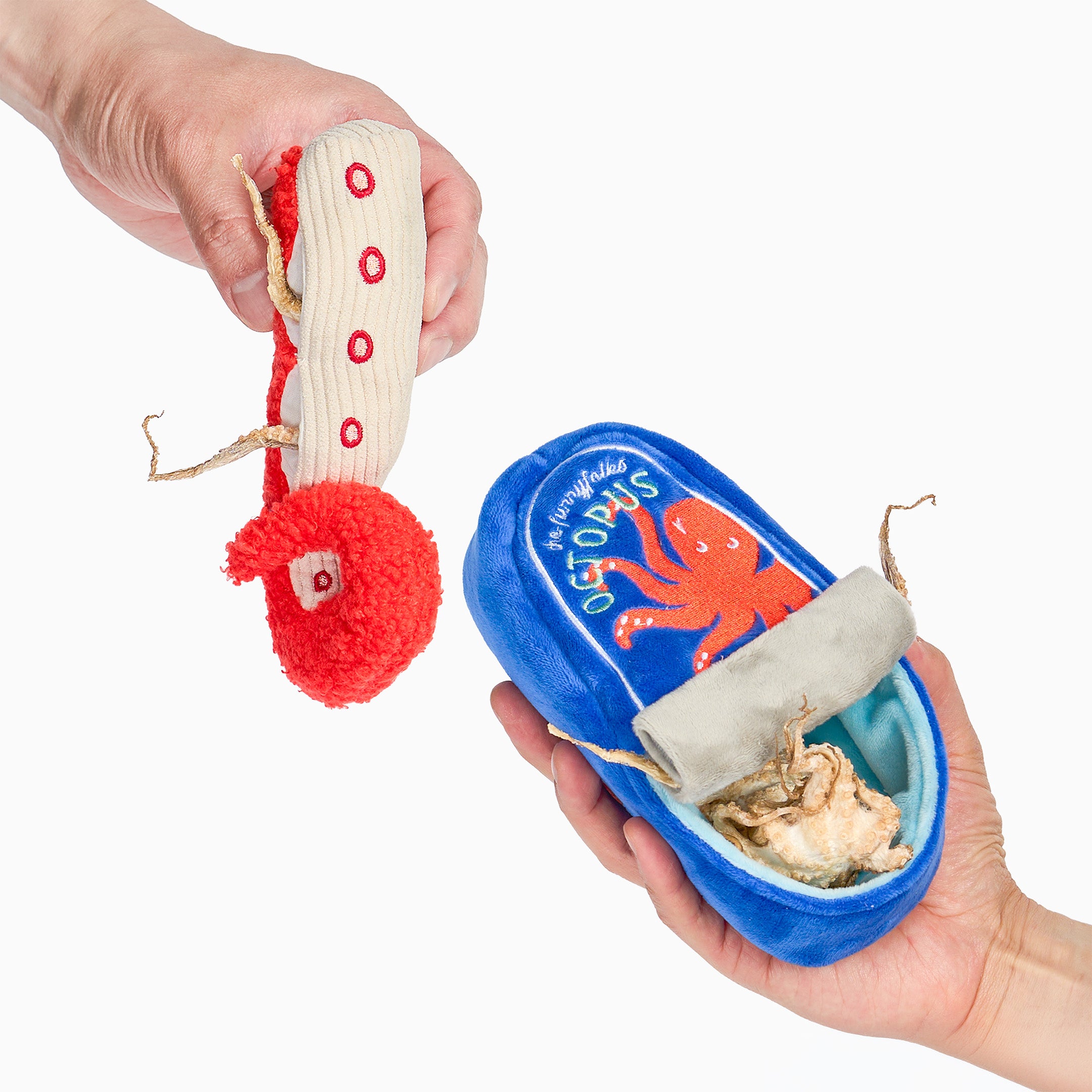 Two hands holding a plush octopus toy and its blue slipper-shaped pouch against a plain white background. The slipper pouch has an orange octopus graphic and the text 'The Whimsical Octopus Co.
