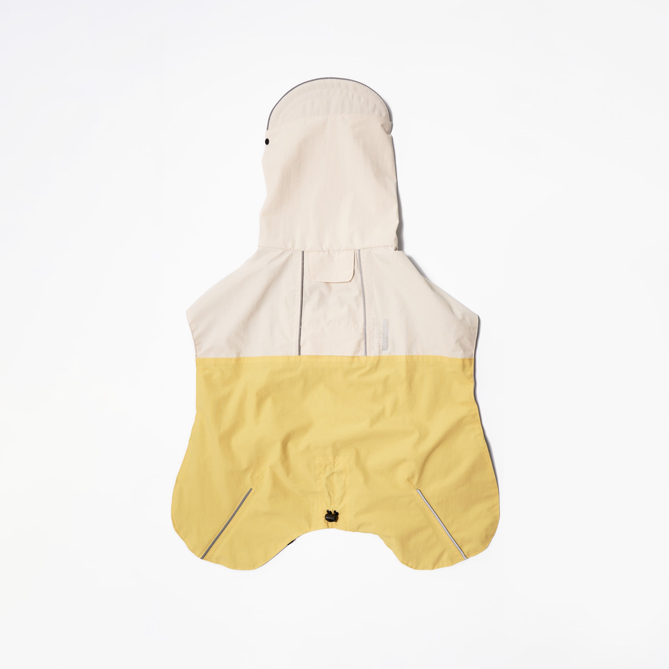 Cream and Yellow Dog Raincoat with Hood on White Background.