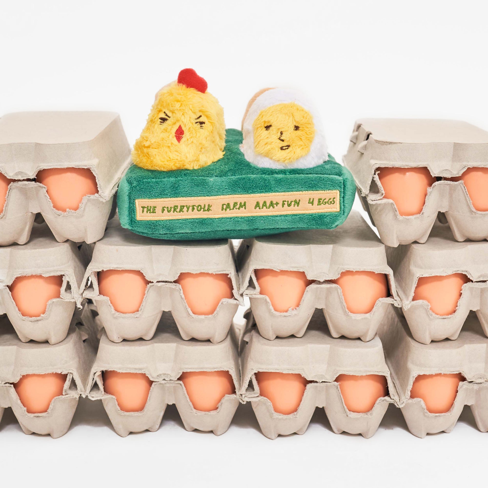 Plush Chickens and Egg Carton Dog Toy for Hide-and-Seek Fun.